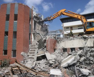 Demolition using rock grabbers